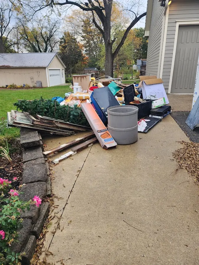 Dumpster being loaded with debris for 3 Yard Dumpster Rental in Calimesa